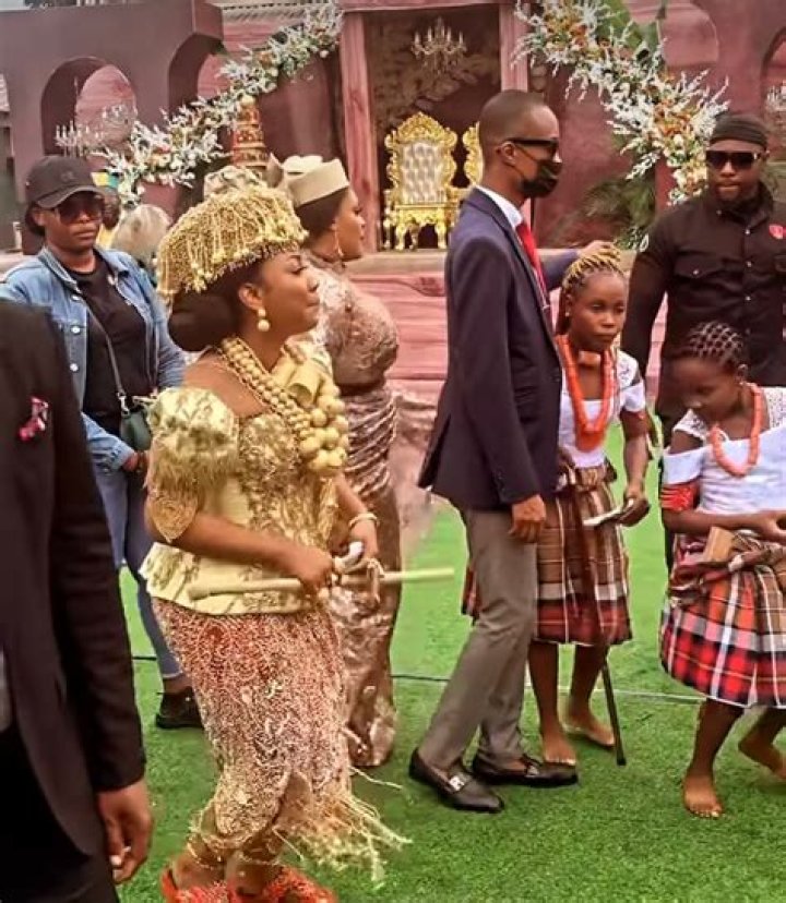 
Mercy Chinwo Holds The Wedding Introduction While Beaming With Excitement 